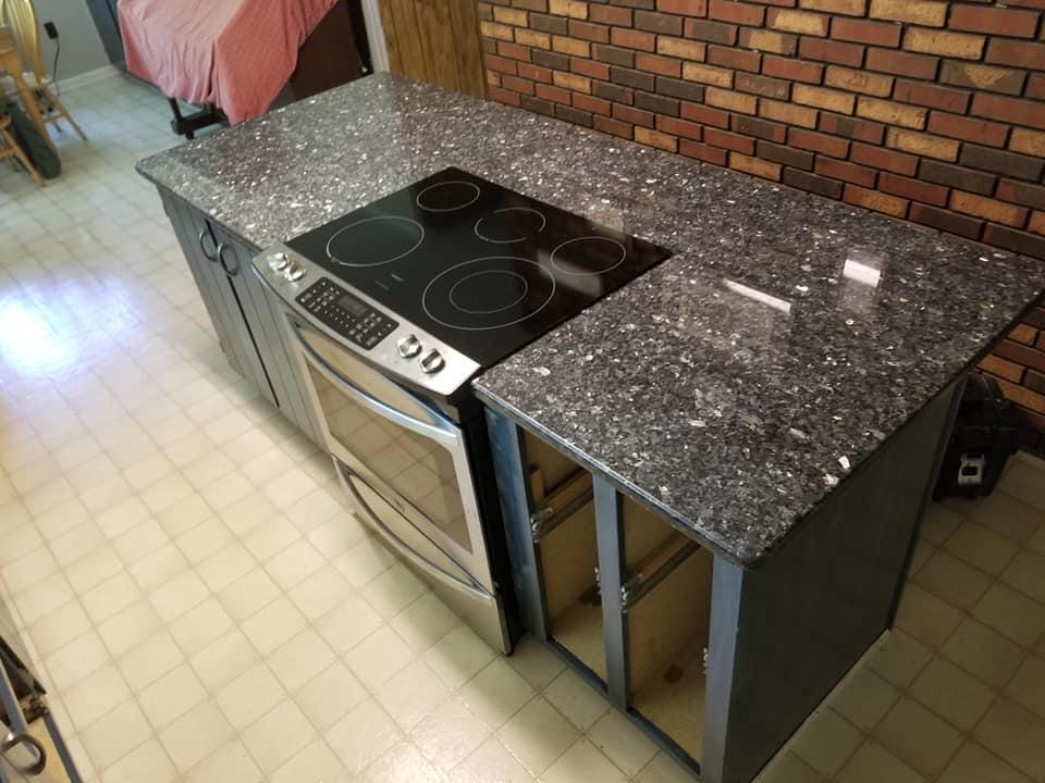 Blue Pearl granite kitchen countertop with range