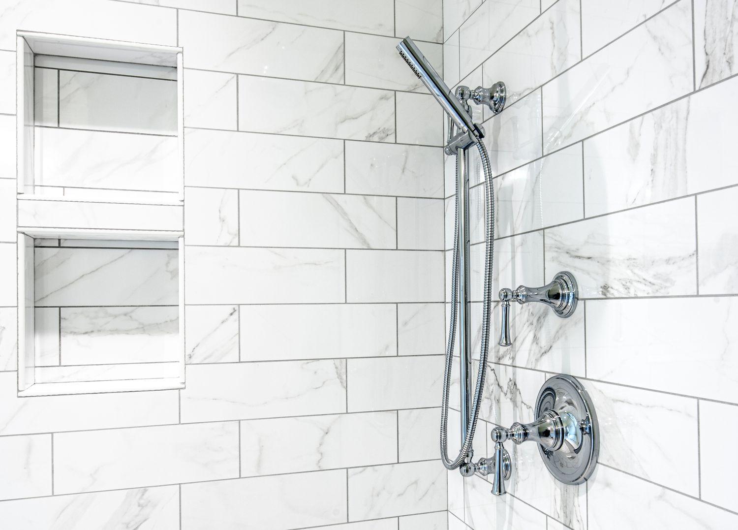 White marbled tile installed in shower